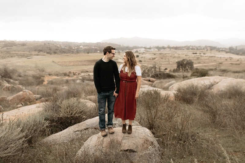 Wedding Photographer Peter Reynolds stands with his wife Lindsey